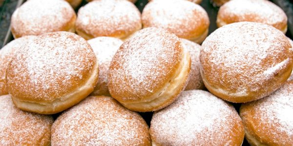 Stack of fresh Berliner jelly doughnuts