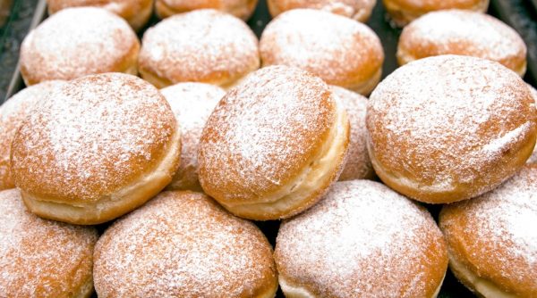Stack of fresh Berliner jelly doughnuts