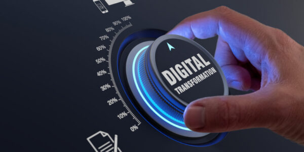 Digital transformation using information technologies as cloud computing, business process management and automation to improve efficiency. Concept with hand turning knob to increase data digitization