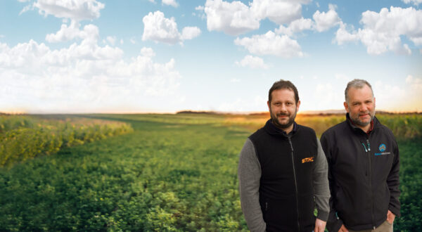 Portrait of happy senior farmer