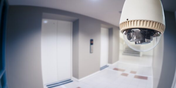 Cctv,Camera,Or,Surveillance,Operating,In,Condominium,With,Fish,Eye