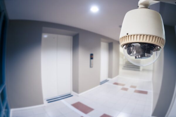 Cctv,Camera,Or,Surveillance,Operating,In,Condominium,With,Fish,Eye